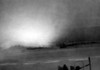 Large Explosion Near U.S. Landing Craft And Soldiers Assaulting Omaha Beach On D-Day. Photograph Taken From A Ship Approaching Omaha Beach During The Allied Invasion Of Normandy On June 6 History - Item # VAREVCHISL037EC198