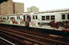 New York City Subway. A Graffiti Painted Subway Train With Housing Projects In The Background. Outside Of Manhattan Many New York Subways Run On Elevated Tracks. May 1973. History - Item # VAREVCHISL031EC152