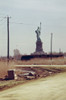 Statue Of Liberty Seen From The Dump In New Jersey That Will Become Liberty State Park That Opened June 14 1976 And Is Now A Popular Site Where Ambitious Politicians Kickoff Presidential Campaigns. Ca. 1973-75. History - Item # VAREVCHISL031EC263