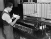 Information Technology Installed In The Social Security Department. A Worker At Of The Automatic Card Sorters As It Was Being Operated. Nov. 27 History - Item # VAREVCCSUA000CS896