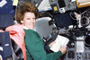 Commander Eileen Collins Consults A Checklist At The Flight Deck Commander'S Station In The Shuttle Columbia. July 24 History - Item # VAREVCHISL034EC045