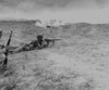 A 'Turkey Shoot' Ended The First Battle Of The Naktong River. U.S. Marine Fires An Automatic Rifle On North Koreans Retreating Across Rice Paddies In Naktong River Valley. Aug. 19 History - Item # VAREVCHISL038EC211