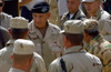 Army General Tommy R. Franks Center Commander Of Coalition Forces Greets Soldiers While Visiting At Bagram Air Base Afghanistan On Aug. 24 2002. History - Item # VAREVCHISL025EC036