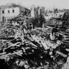 World War 1 Battle Of Belleau Wood. A French Women And Child Sort Through The Ruins Of The Village Of Belleau After The June 1918 Battle. History - Item # VAREVCHISL043EC984