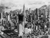 Aerial View Of Mid-Town Manhattan During Construction Of Rockefeller Center. In Center Background Is The Chrysler Building. 1932. History - Item # VAREVCHISL008EC219