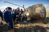 Soyuz Tma-21 Spacecraft Shortly After The Capsule Landed In Kazakhstan. The Russian Land Crew Begins To Open The Heat Scorched Capsule Containing International Space Station Expedition 28 Crew. Sept. 16 History - Item # VAREVCHISL034EC030
