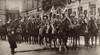 German Soldiers Welcomed Home From The World War 1. 1918. Squadron Of Prussian Cavalry With Decorated Flagstaffs Standing Before Berlin Building Festooned With Wreaths. History - Item # VAREVCHISL034EC996