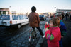 A Child Blows Bubbles As Carsfreely Cross The Border Of East And West Berlin At Potsdamer Platz. Dec. 21 1989. History - Item # VAREVCHISL023EC217