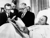 President Lyndon Johnson Working In Bed After Gall Bladder Surgery. President Johnson Looks Over Documents In His Hospital Bed At Bethesda Naval Hospital As Newsmen Look On. Nov. 16 History - Item # VAREVCCSUA000CS692