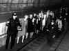 Policemen Lead Commuters Through A Subway Tunnel. They Were Trapped Here Late On November 9Th When A Massive Power Failure Stopped All Trains. New York History - Item # VAREVCSBDNEYOCS037