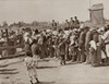 World War 1 In Eastern Europe. Peasants In Retreat From Warsaw Wait For A Meal At A Food Depot Established By The Russians. 1914-15. History - Item # VAREVCHISL044EC054
