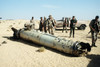 Military Personnel Examine A Scud Missile Shot Down By An Patriot Air Defense Missile During Operation Desert Storm. May 26 1992. History - Item # VAREVCHISL023EC148