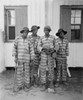 Four African American Youths In A Southern Chain Gang. Southern Jails Made Money Leasing Convicts For Forced Labor In The Jim Crow South. Circa. 1900 History - Item # VAREVCHISL017EC267