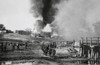 German Infantry Advancing On A Burning Village In The Soviet Union. Summer Of 1941 History - Item # VAREVCHISL037EC751