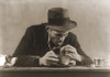 Hungry Man With His Meal Of Bread And Soup At A New York City Soup Kitchen During The Great Depression. His Fedora And Now Ragged Sports Jacket Indicate His Past Employment. 1930S. History - Item # VAREVCHISL019EC190