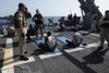U.S. Sailors Guard Suspected Pirates On The Flight Deck Of The Guided Missile Cruiser Uss Gettysburg In The Gulf Of Aden April 17 2009. History - Item # VAREVCHISL024EC246