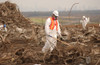 Workers At The Fresh Kills Landfill Gather Debris From The World Trade Center For Victim Identification And Evidence Related To The Attack. Oct. 16 2001. Photo Everett Collection History - Item # VAREVCHISL029EC225