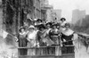 Old Glory. Group Of Women Standing On Top Of Vehicle Waving Flags History - Item # VAREVCHCDLCGBEC421