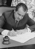 Richard Nixon Signing A Bill Into Law. Ca. 1969-74. History - Item # VAREVCHISL032EC168