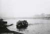 German Soldiers Crossing The Dnieper River In A Small Boat. By The End Of August 1941 History - Item # VAREVCHISL037EC559