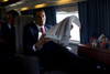 President Barack Obama Reading The Business Section Of The New York Times In The Marine One Helicopter Flying From The White House To The U.S. Naval Academy In Annapolis Maryland. May 22 2009. History - Item # VAREVCHISL025EC171