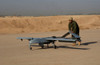 Us Army Soldier With An Intelligence Battalion Recovers An Unmanned Aerial Vehicle Following A Mission Over The Baqubah Iraq Area. Sept. 22 2004. History - Item # VAREVCHISL028EC022