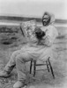 Eskimo Man Reading Saturday Evening Post In The Arctic Region History - Item # VAREVCHISL043EC600