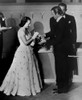 1949 Best Actress Olivia De Havilland [The Heiress] Receives Her Award From James Stewart As Price Waterhouse Rep Francis Holford Stands By History - Item # VAREVCSBDOSPIEC115