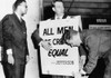 Actor Charlton Heston Adjusts A Sandwich Board For A Civil Rights Demonstration. Oklahoma City History - Item # VAREVCCSUB002CS122