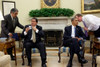 Press Secretary Robert Gibbs Whispers To President Obama During An Oval Office Meeting With President Alan Garcia Perez Of Peru. June 1 2010. History - Item # VAREVCHISL026EC262