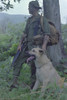 Vietnam War. Camouflaged Us Marine And His Scout Dog Named 'Major' In Vietnam. Nov. 1967. History - Item # VAREVCHISL033EC603