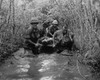 Vietnam War. Us Soldiers Carry A Wounded Comrade Through A Swampy Area. 1969. History - Item # VAREVCHISL033EC594