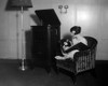Woman With Record Albums And Victrola History - Item # VAREVCHCDLCGAEC251