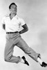 Gene Kelly. Courtesy Csu Archives  Everett Collection History - Item # VAREVCPWDGEKECS001 Gene Kelly. Courtesy Csu Archives  Everett Collection History - Item # VAREVCPWDGEKECS001