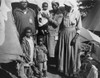 African American Women With Three Children During The 1927 Mississippi River Flood. The Red Cross Provided Relief At Segregated Refugee Camps On The Vicksburg National Military Park. History - Item # VAREVCHISL040EC911