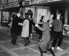 Teens Dancing The 'Twist' Outside The Brooklyn Fox Theatre Before The Premiere Of The Movie 'Twist Around The Clock'. 1961. History - Item # VAREVCHISL033EC824