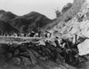 U.S. 3Rd Army Division Patrol Pinned Down By Chinese Fire From The Hills As They Protect A Convoy Under Attack In North-East Korea 1950. Korean War History - Item # VAREVCHISL038EC339