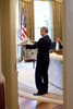 Rahm Emanuel Looks At A Newspaper In The Oval Office As President Obama Talks On The Phone. April 24 2009. History - Item # VAREVCHISL026EC091