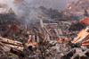 Nyc Fire Fighter Walks Over Smouldering Fires And Wreckage At Ground Zero History - Item # VAREVCHISL040EC106