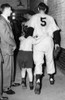 Joe Dimaggio And His Son Walk To The Locker Room After The New York Yankees' Victory In The World Series History - Item # VAREVCPBDJODICS010