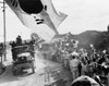 U.S. First Cavalry Division Troops Pass Cheering Koreans North Of Seoul On The Way To The 38Th Parallel. A South Korean Flag Flies In Foreground With Smaller Flags Waved In The Crowd. Ca. Oct. 9 History - Item # VAREVCHISL038EC305