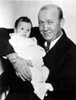Knute Rockne Holding A Baby. - Cpl ArchivesEverett Collection History - Item # VAREVCHBDKNROCL001