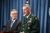 General Tommy Franks Commander Of U.S. Central Command In Afghanistan Alongside Secretary Of Defense Donald Rumsfeld Speaks During A Press Briefing On Aug. 15 2002. History - Item # VAREVCHISL025EC037