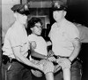 Two Policemen Carry A Young African-American Woman Arrested During A Sit-In At The First National Bank In St. Louis History - Item # VAREVCHISL033EC743