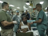 Medical Personnel Of Uss Bataan Treat Wounded Pashtun Soldier From Afghanistan Dec. 6 2001. History - Item # VAREVCHISL024EC173