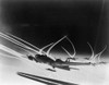 Sub-Stratospheric Vapor Trails Of B-17 Flying Fortresses Of The U.S. Army 8Th Air Force. The Curved Trails Were Made By Fighters Accompanying The B-17S. World War 2. Ca. 1944. History - Item # VAREVCHISL037EC415