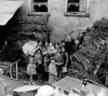 French Family Outside Their Home In Saint Lo History - Item # VAREVCHISL037EC102