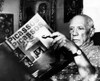 Artist Pablo Picasso Reads Fom His Book At His Home On The French Riviera. 101960. Courtesy Csu ArchivesEverett Collection History - Item # VAREVCPBDPAPICS001