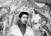 Cesar Chavez Stands In Front Of 'The Delano Bell' Mosaic History - Item # VAREVCHBDCECHCS002