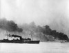 Ship Leaving Dunkirk Carrying Defeated British And French Soldiers To England. In The Background The French Port Of Dunkirk Burns Under The German Advance. World War 2. May 26-June 4 History - Item # VAREVCHISL037EC530